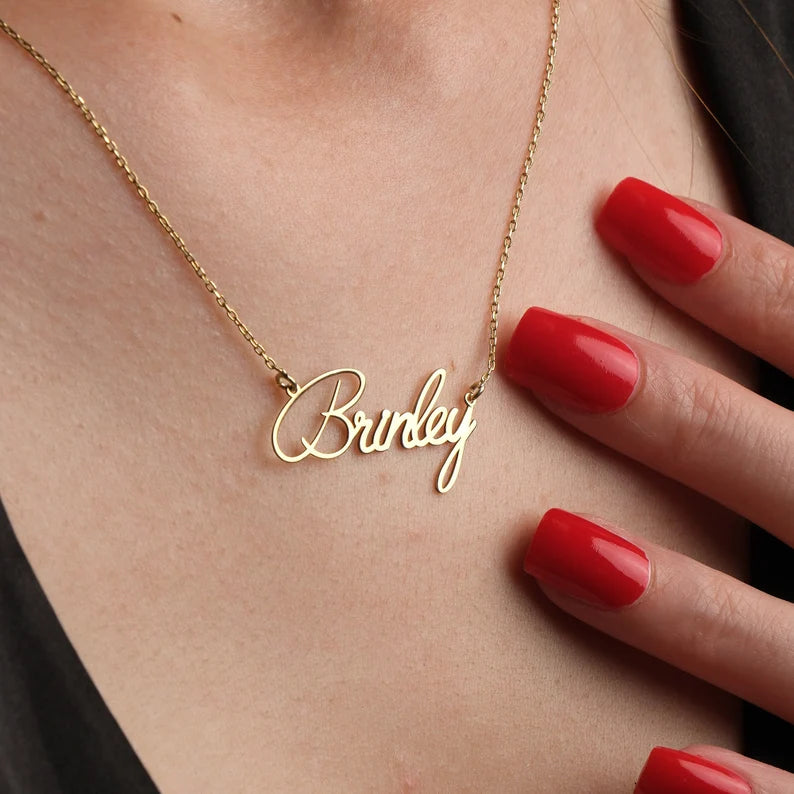 Gold Personalized Name Necklace Designed and handcrafted in the UAE. This classic gold name necklace is locally handcrafted with the highest quality materials and artisans available in Dubai. Perfect gift for a best friend, lover and family.
