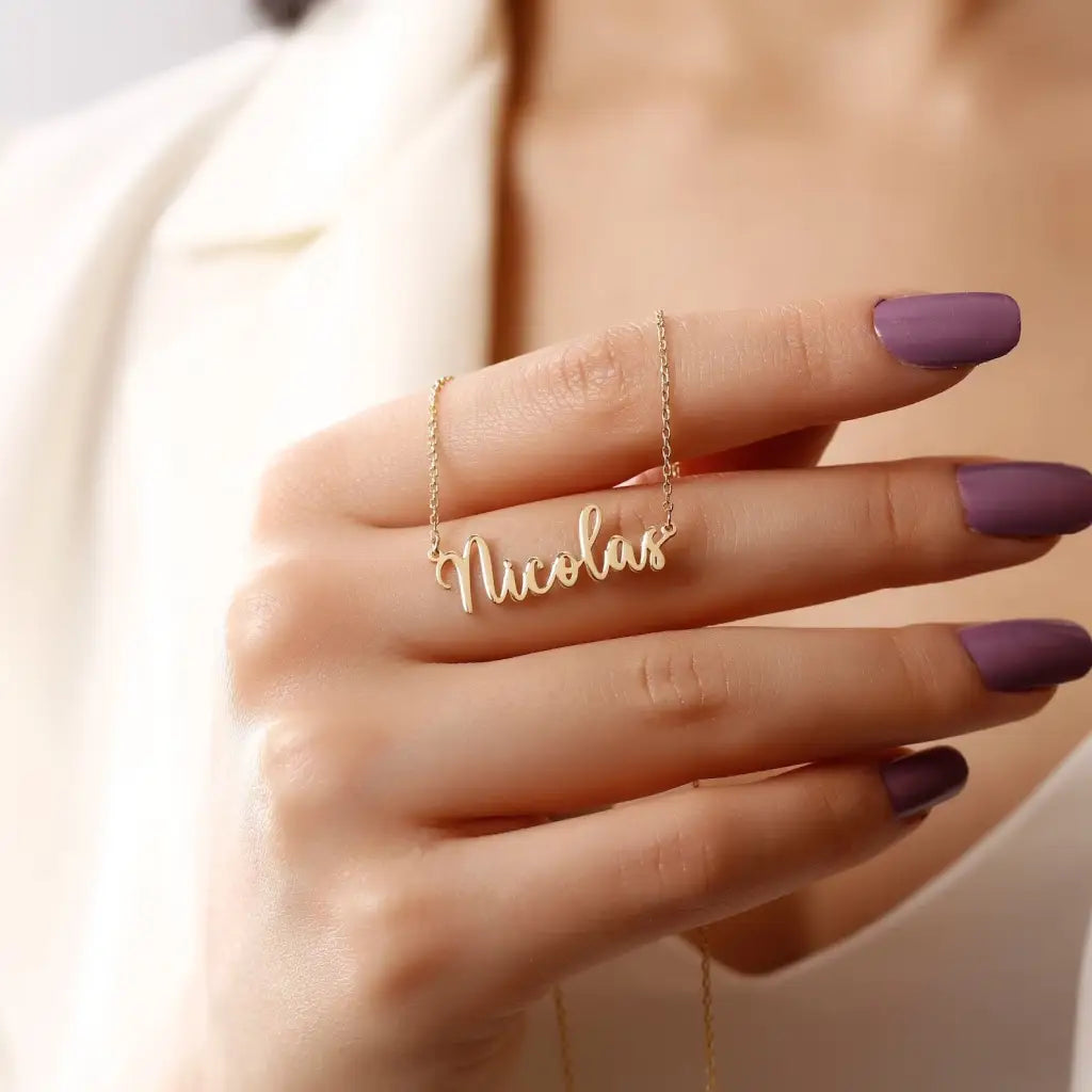 Gold Personalized Name Necklace Designed and handcrafted in the UAE. This classic gold name necklace is locally handcrafted with the highest quality materials and artisans available in Dubai. Perfect gift for a best friend, lover and family.