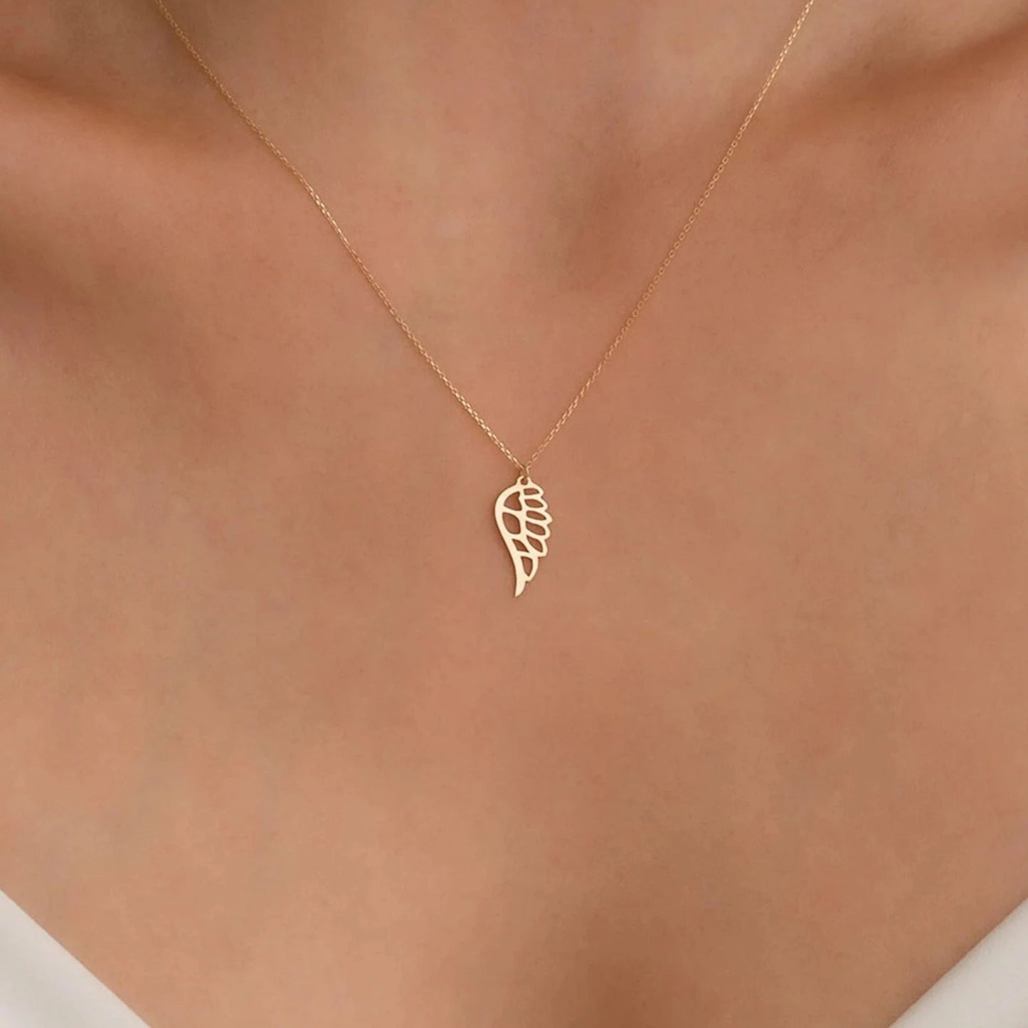 18 carat gold Angel Wing necklace - Burst of Arabia - UAE