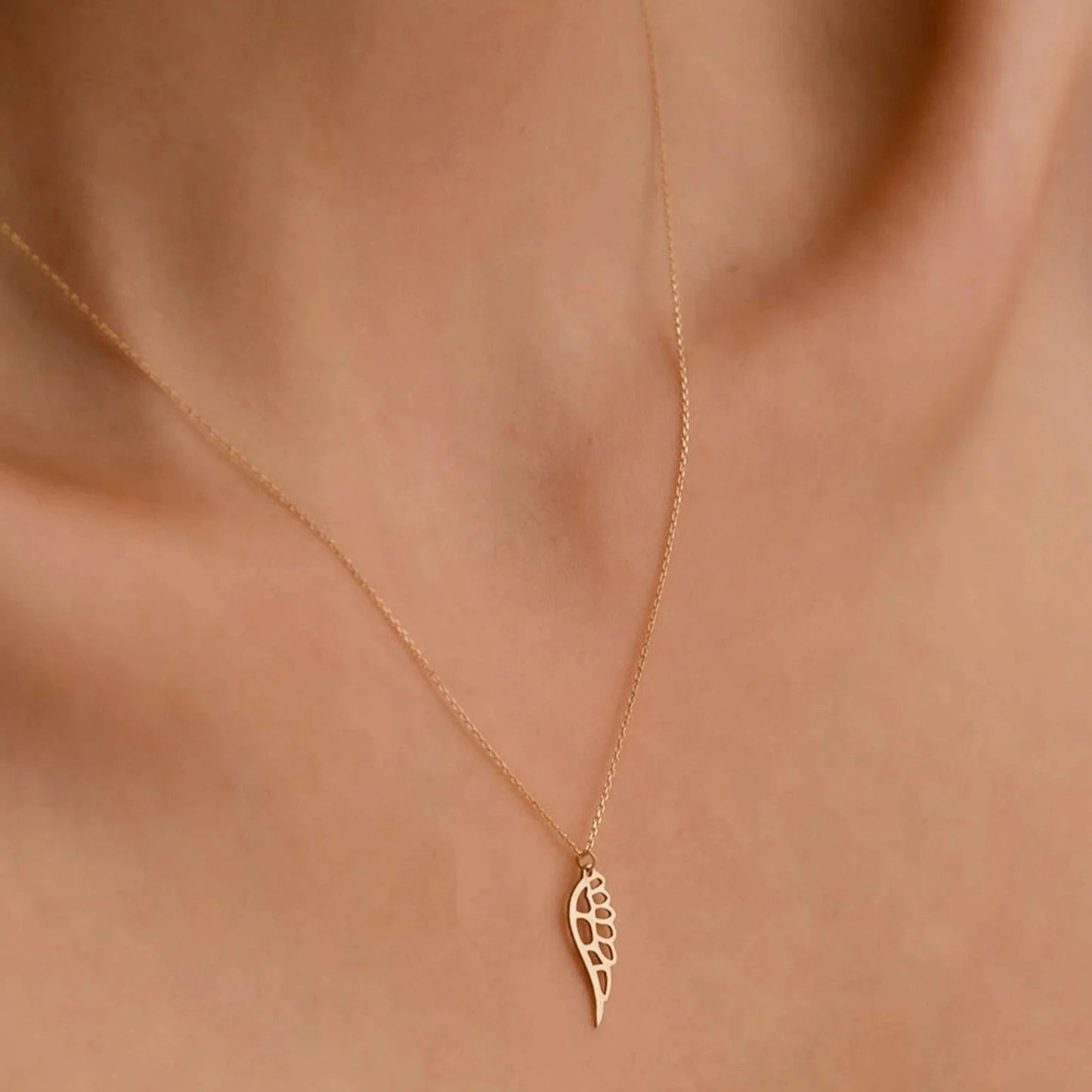 18 carat gold Angel Wing necklace - Burst of Arabia - UAE