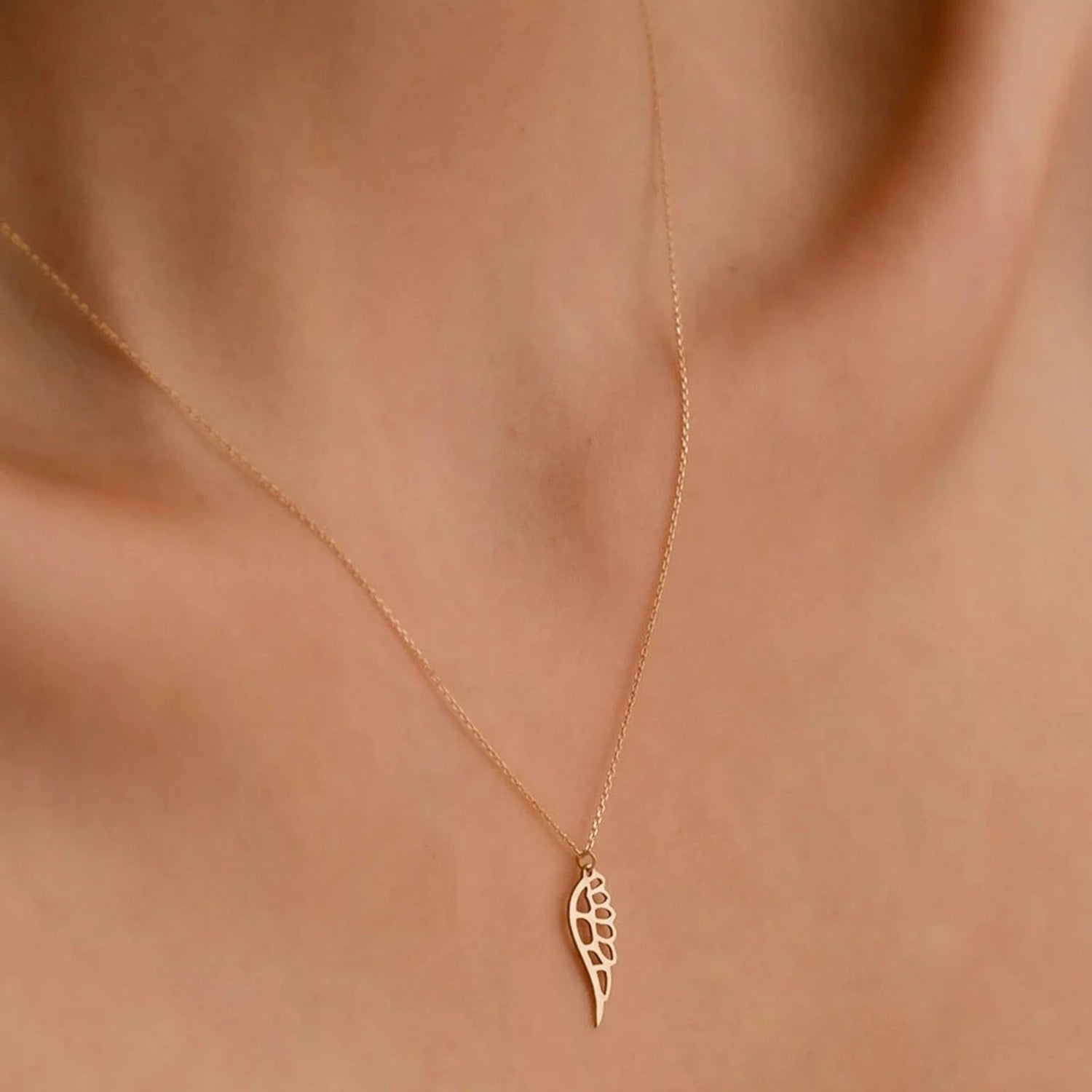 18 carat gold Angel Wing necklace - Burst of Arabia - UAE