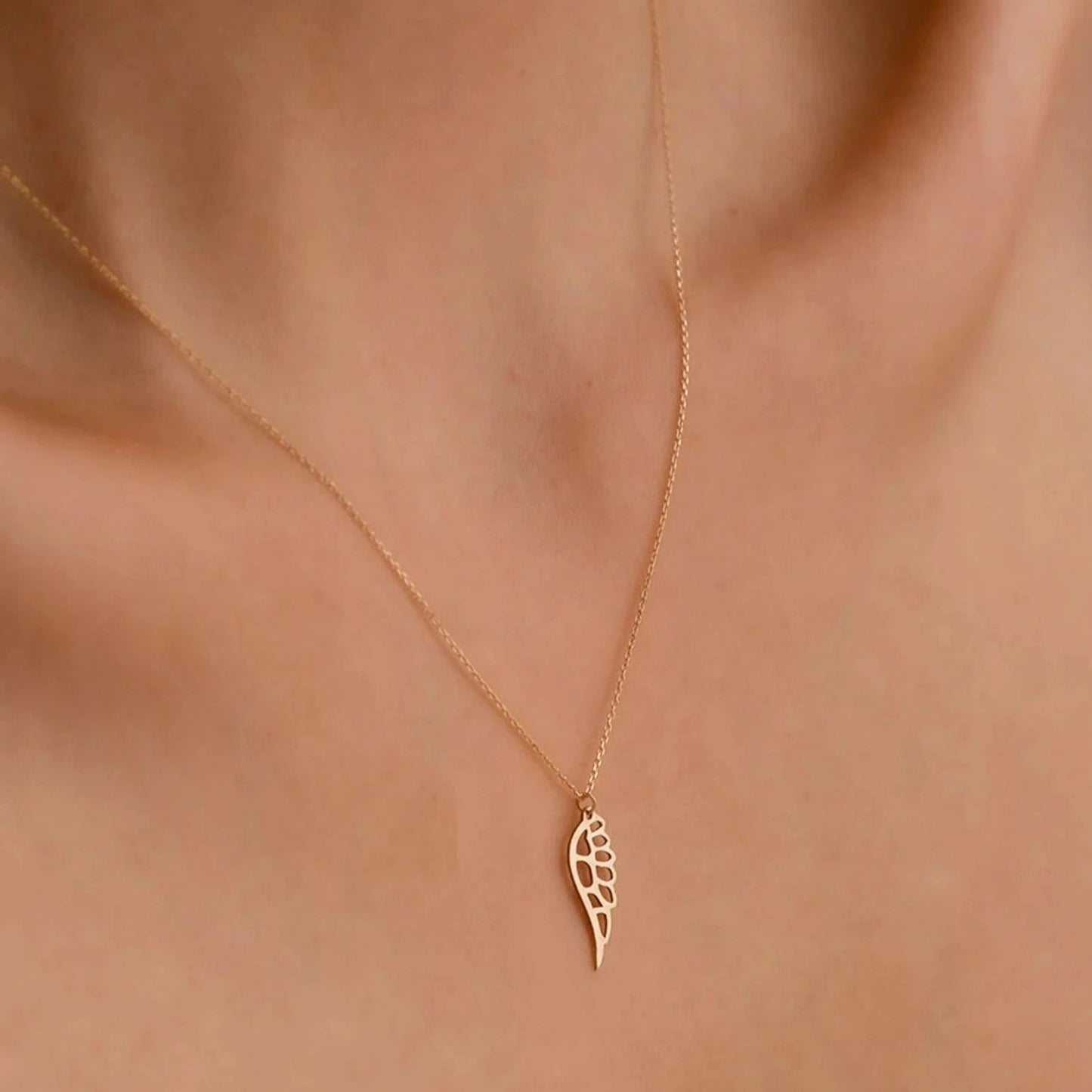 18 carat gold Angel Wing necklace - Burst of Arabia - UAE