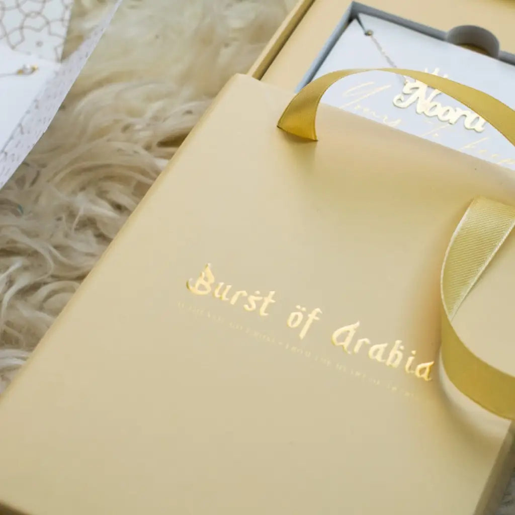 Arabian name earrings made in real gold. Designed and handcrafted in the UAE. These gorgeous authentic Arabic name earrings are locally handcrafted with the highest quality materials and artisans available in Dubai.