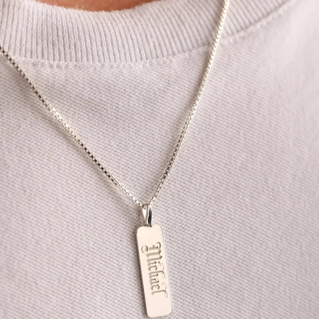 Luxury gold bar engraved pendant made of genuine 18k solid gold and personalized with the initials/words of your choice. A thoughtful luxury anniversary gift for your boyfriend or husband, and the perfect expensive birthday gift for a father or a brother.