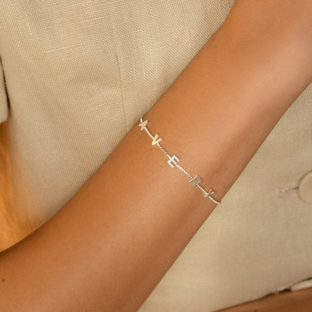 Initial letter bracelet, anniversary gift for women, birthday gift for her. Handcrafted in Dubai, UAE.