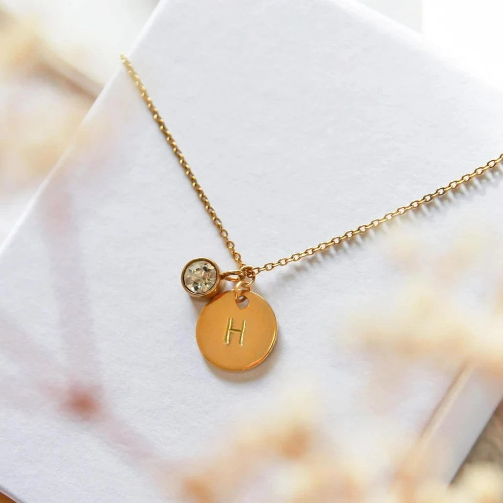 Personalized Alphabet Initial Birthstone Necklace. Locally designed and handcrafted. Delivered in 3-5 days across Dubai and the UAE.