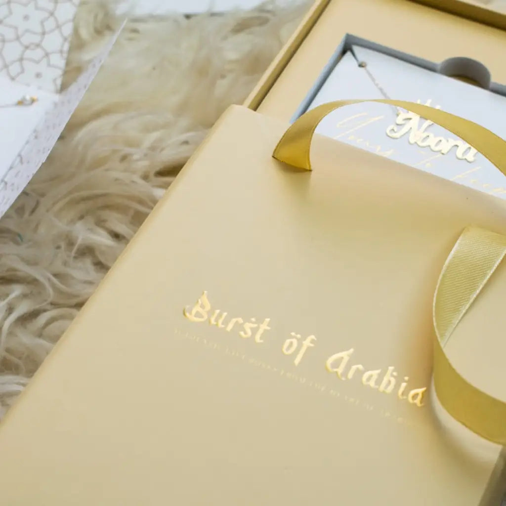 Birth flower name earrings made in real gold. Designed and handcrafted in the UAE. These gorgeous elegant birth flower name earrings are locally handcrafted with the highest quality materials and artisans available in Dubai.