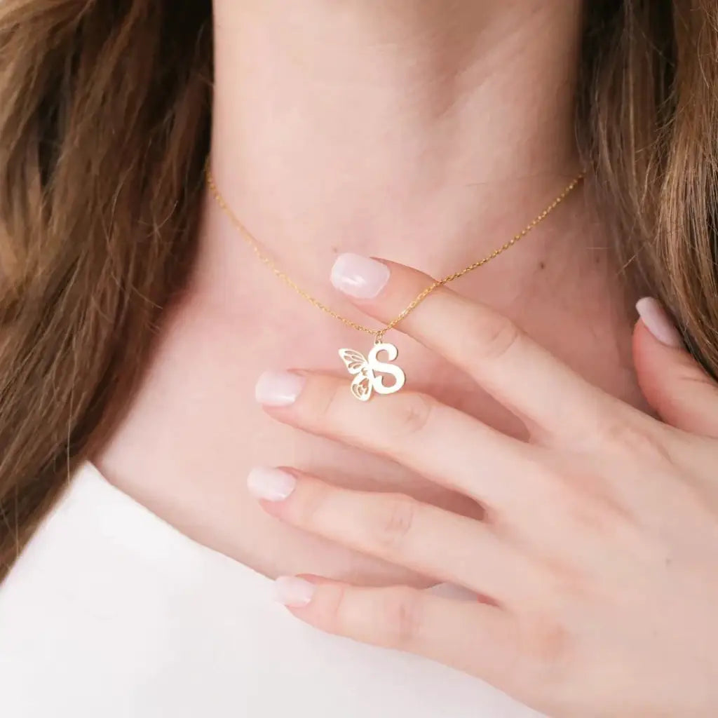 Personalized 18K gold Butterfly Initial Birthstone Necklace Designed and handcrafted in Dubai, the UAE.