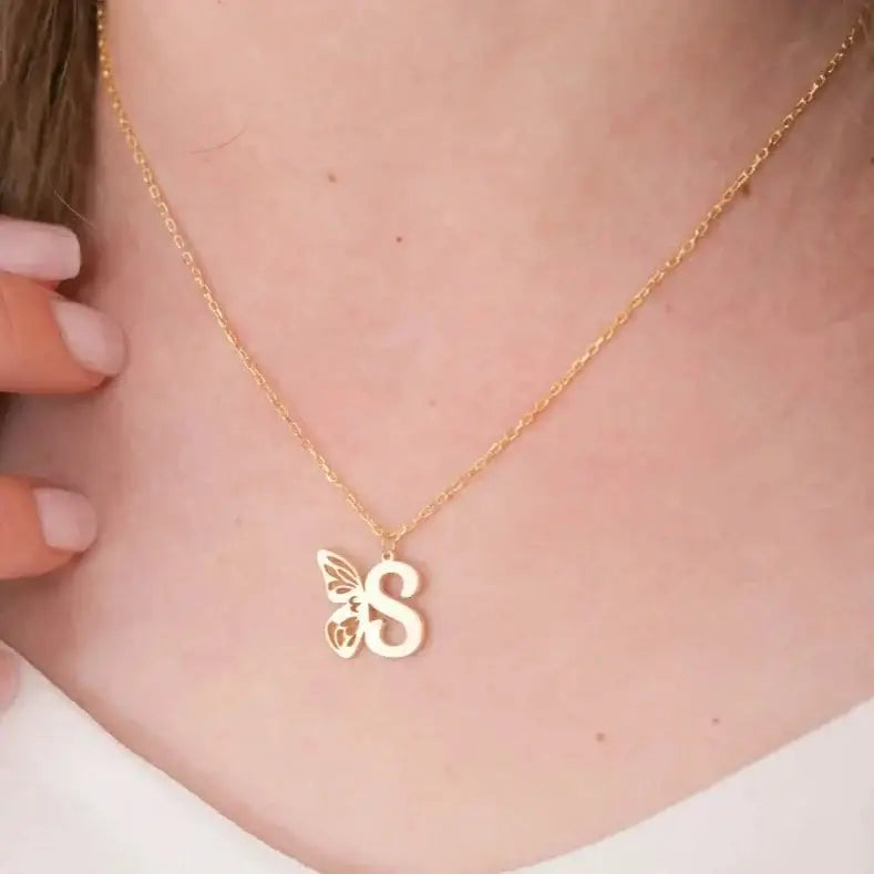 Personalized 18K gold Butterfly Initial Birthstone Necklace Designed and handcrafted in Dubai, the UAE.