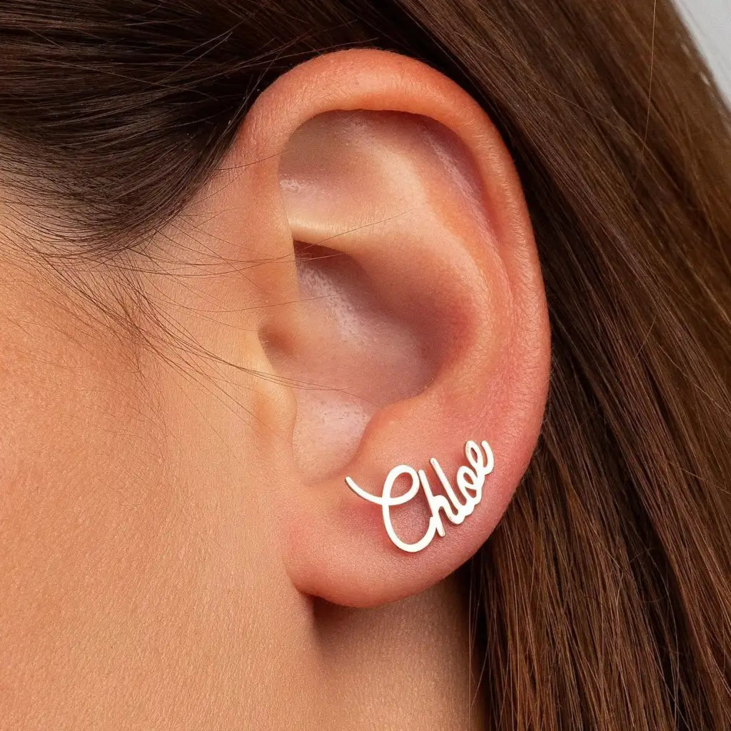 Personalized Name Earrings. Designed and handcrafted in the UAE. These gold alphabet name earrings are locally handcrafted with the highest quality materials and artisans available in Dubai.