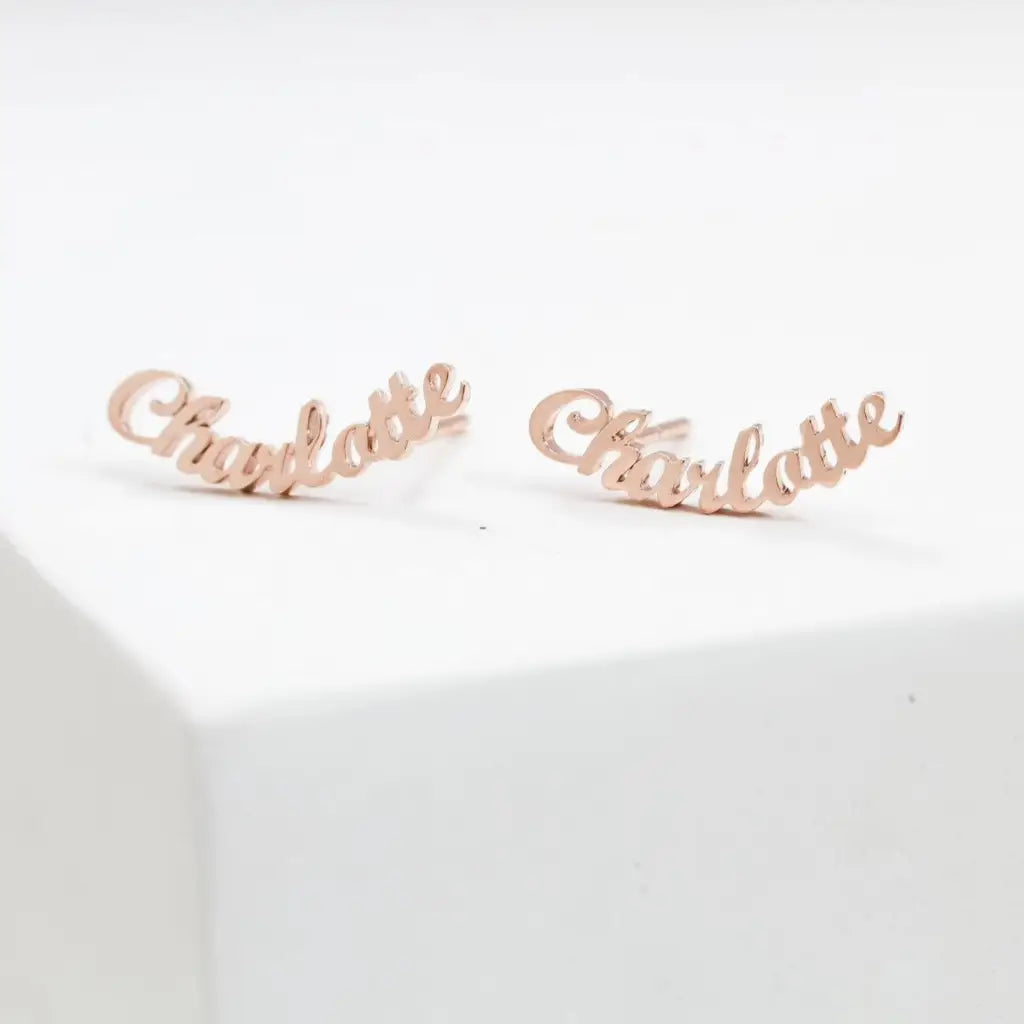 Personalized Name Earrings. Designed and handcrafted in the UAE. These gold alphabet name earrings are locally handcrafted with the highest quality materials and artisans available in Dubai.