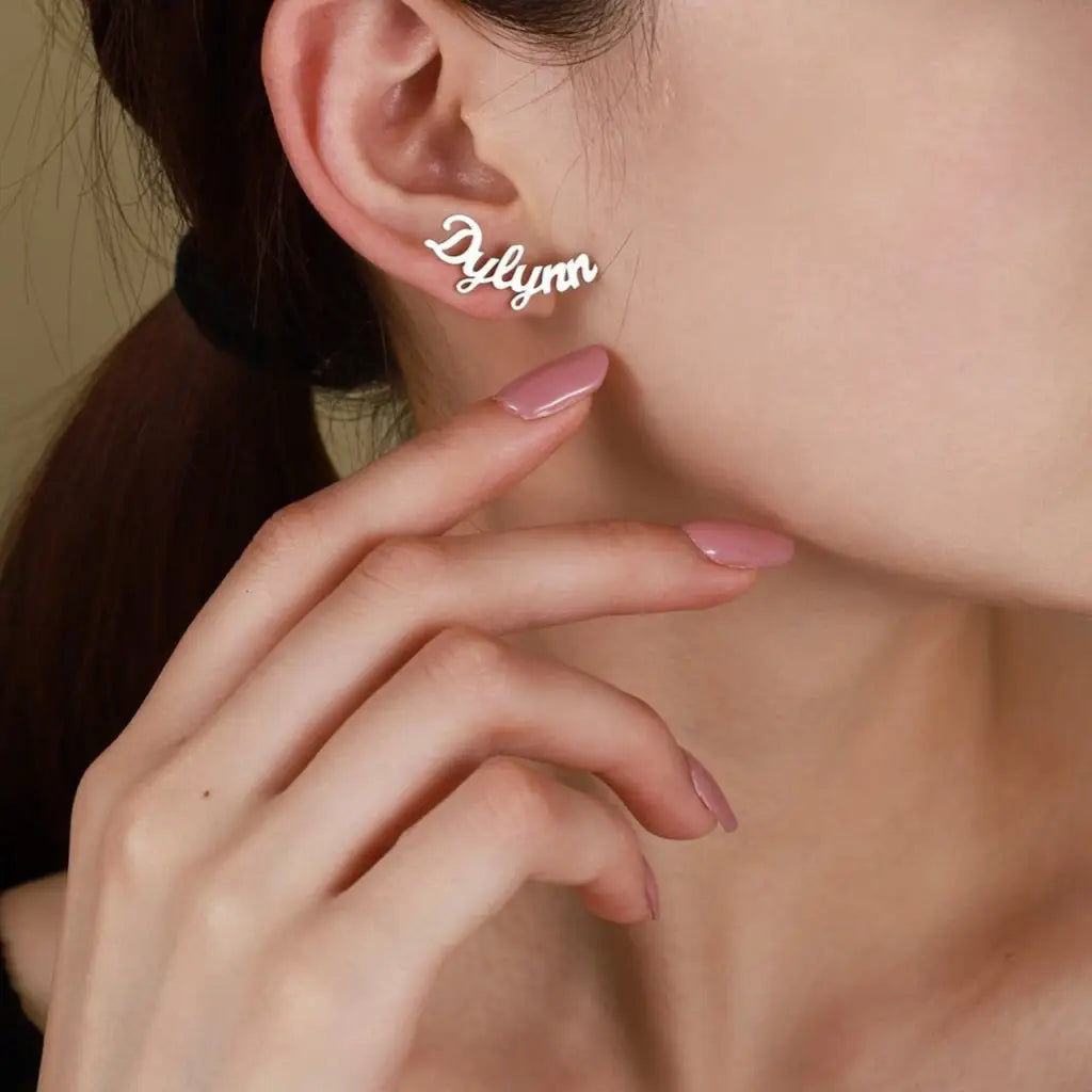 Personalized Name Earrings. Designed and handcrafted in the UAE. These gold alphabet name earrings are locally handcrafted with the highest quality materials and artisans available in Dubai.