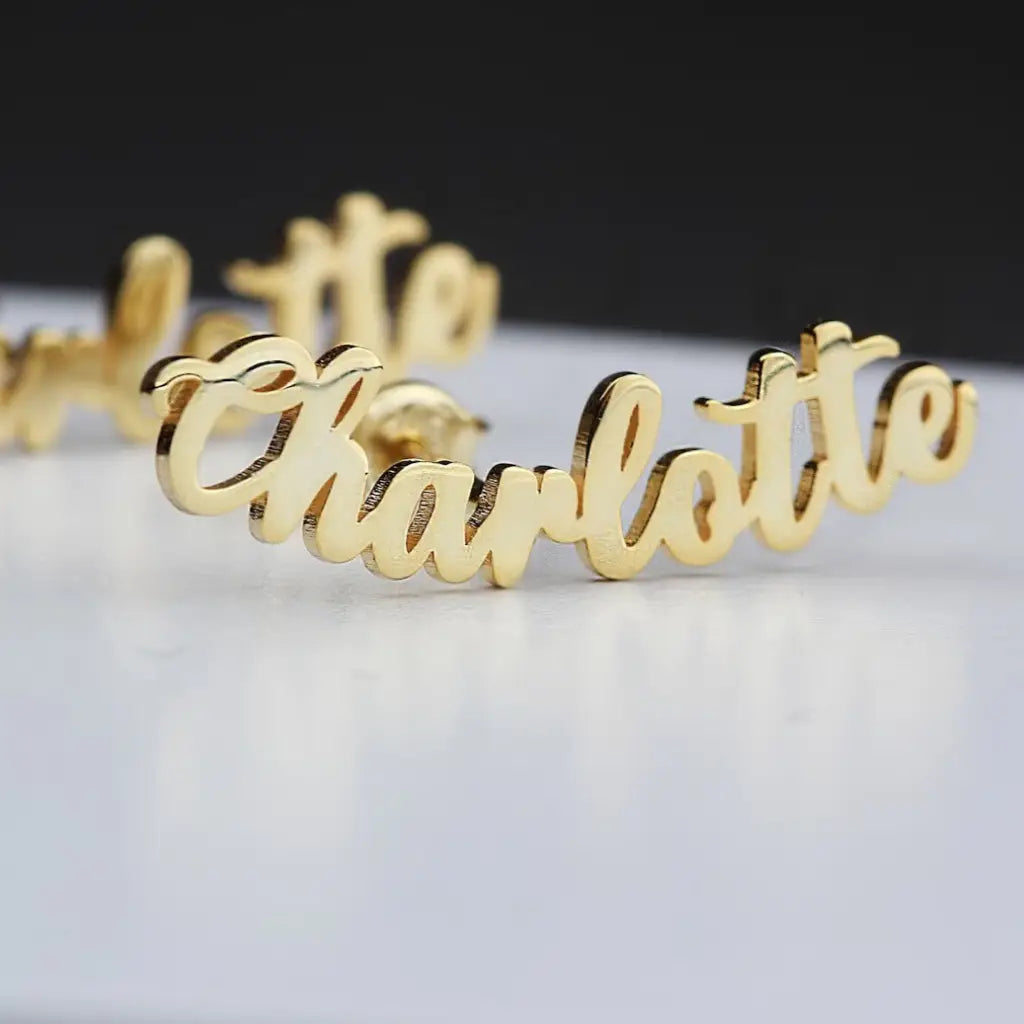 Personalized Name Earrings. Designed and handcrafted in the UAE. These gold alphabet name earrings are locally handcrafted with the highest quality materials and artisans available in Dubai.