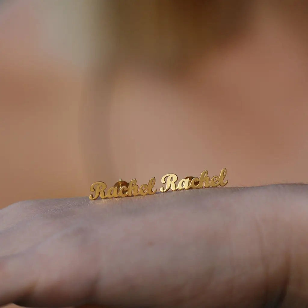 Personalized Name Earrings. Designed and handcrafted in the UAE. These gold alphabet name earrings are locally handcrafted with the highest quality materials and artisans available in Dubai.