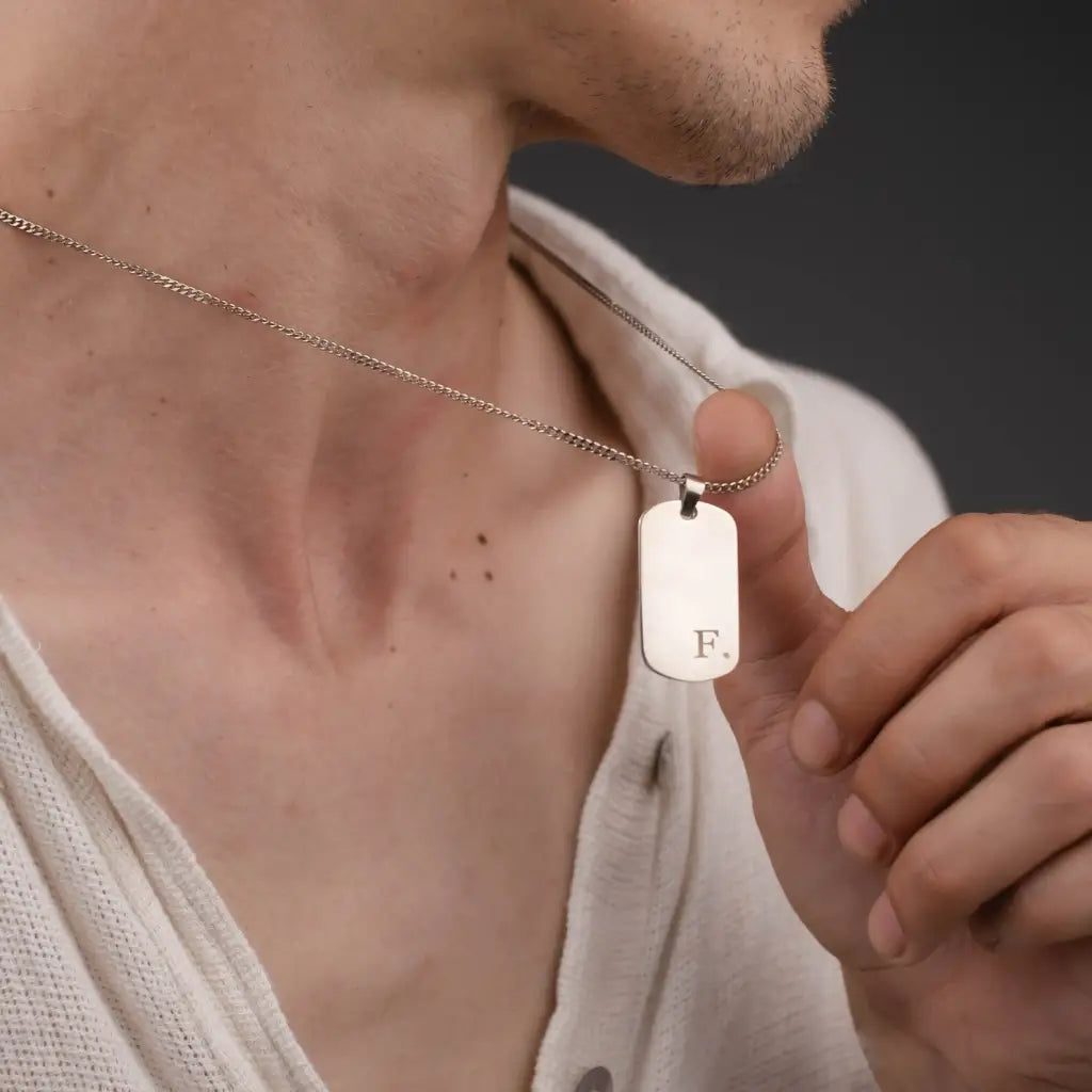 Gold ngraved bar necklace for men, made of 18k solid gold. A thoughtful luxury anniversary gift for your boyfriend or husband, and the perfect expensive birthday gift for a father or a brother.
