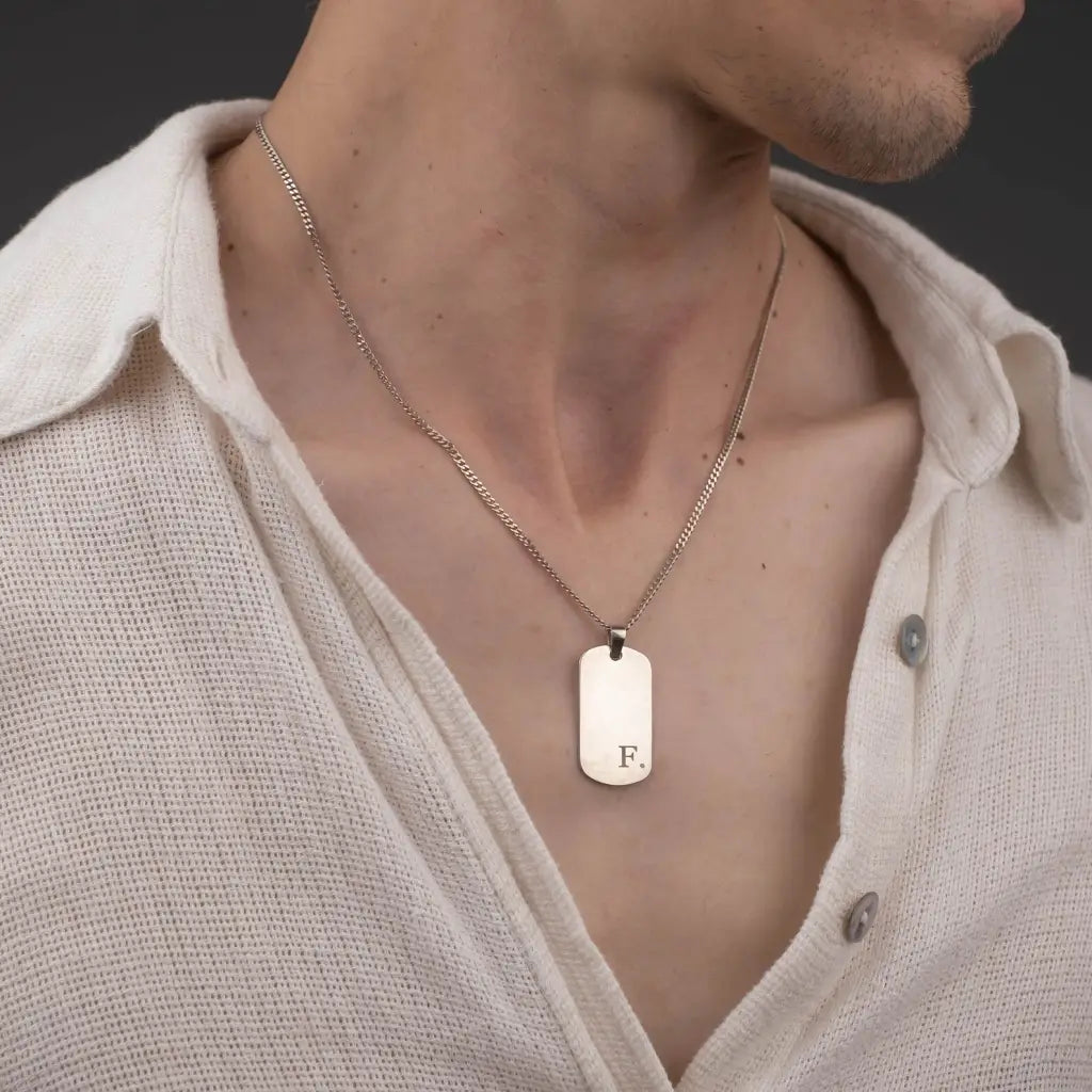 Gold ngraved bar necklace for men, made of 18k solid gold. A thoughtful luxury anniversary gift for your boyfriend or husband, and the perfect expensive birthday gift for a father or a brother.