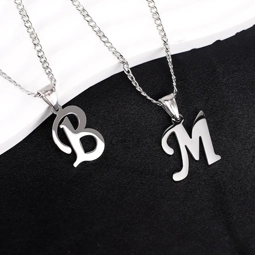Trendy and elegant, this stunning gold alphabet pendant has a playful charm. Attached to a box chain made of genuine solid gold and personalized with the initial of your choice. A thoughtful luxury anniversary gift for your boyfriend or husband, and the perfect expensive birthday gift for a father or a brother.