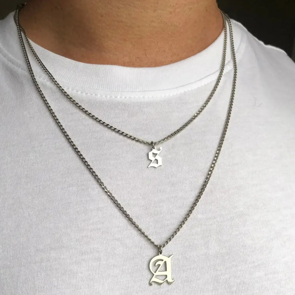 Luxury gold alphabet pendant made of genuine 18k solid gold and personalized with the initials of your choice. A thoughtful luxury anniversary gift for your boyfriend or husband, and the perfect expensive birthday gift for a father or a brother.