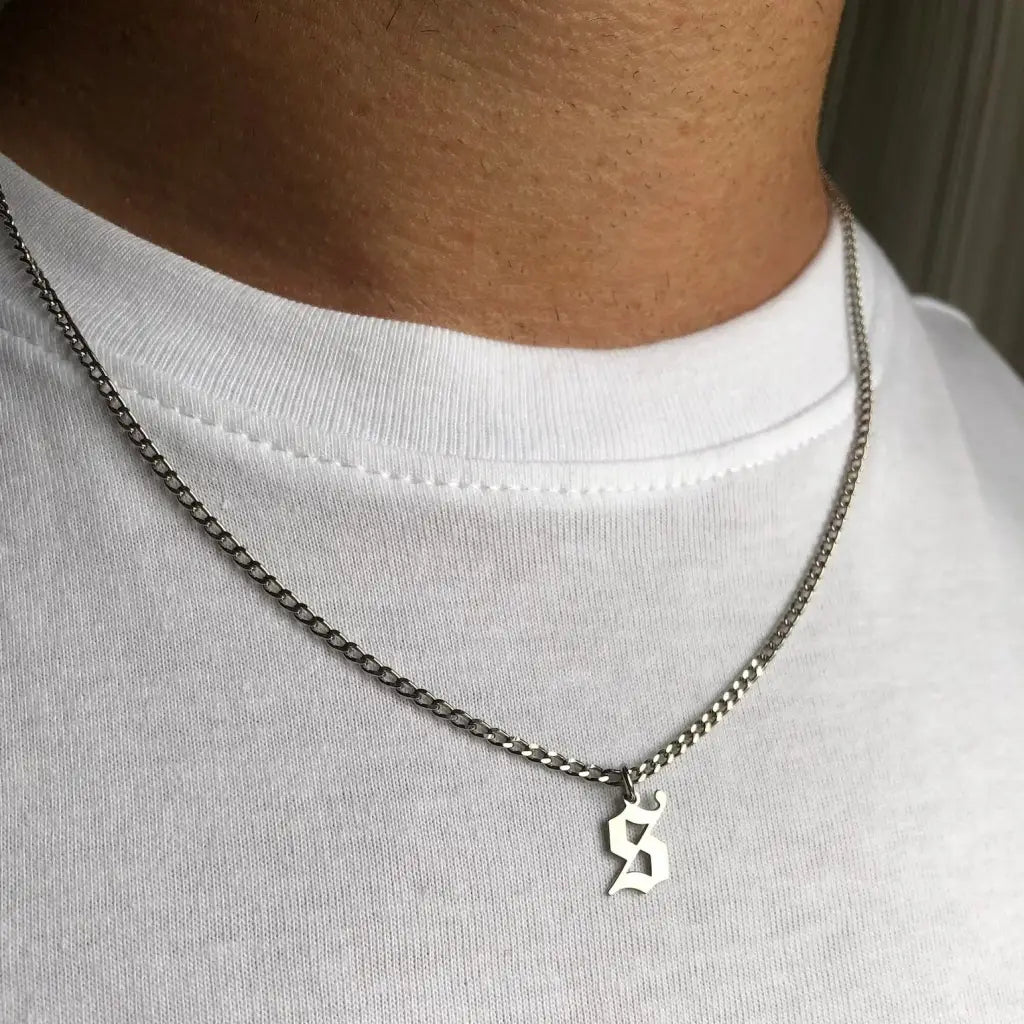 Luxury gold alphabet pendant made of genuine 18k solid gold and personalized with the initials of your choice. A thoughtful luxury anniversary gift for your boyfriend or husband, and the perfect expensive birthday gift for a father or a brother.