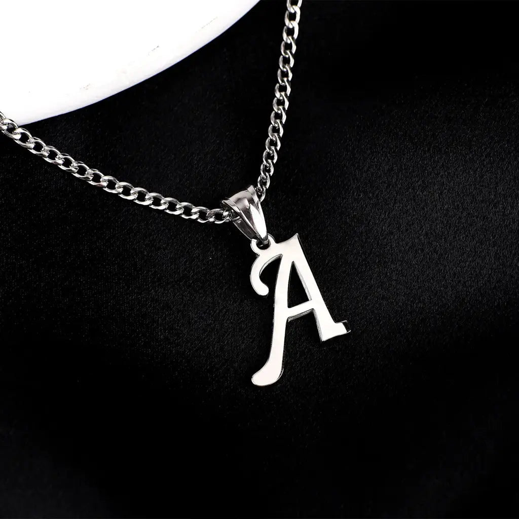 Trendy and elegant, this stunning gold alphabet pendant has a playful charm. Attached to a box chain made of genuine solid gold and personalized with the initial of your choice. A thoughtful luxury anniversary gift for your boyfriend or husband, and the perfect expensive birthday gift for a father or a brother.