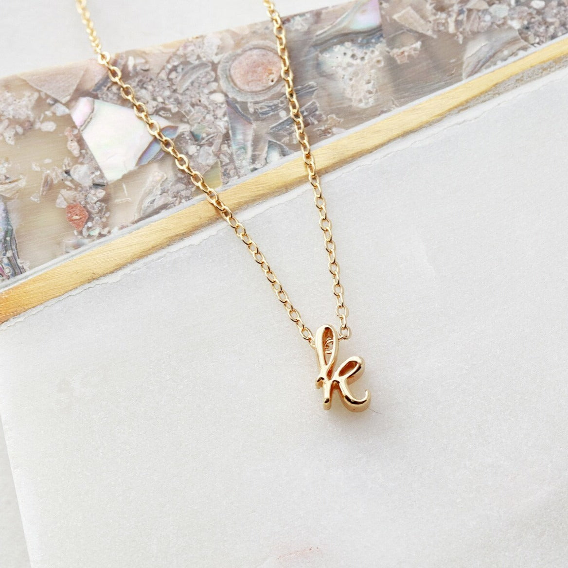 Gold customized 18 carat gold lower case initial bracelet - perfect anniversary gift - luxury gifts for women, girlfriend, wife, sister, mom in Dubai.
