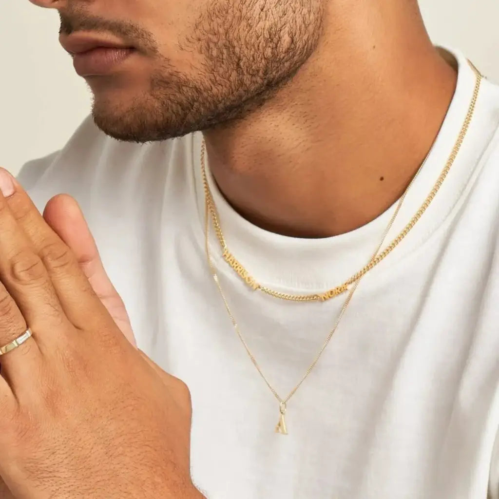 Luxury gold double name necklace made of genuine 18k solid gold and personalized with the names/words of your choice. A thoughtful luxury anniversary gift for your boyfriend or husband, and the perfect expensive birthday gift for a father or a brother.