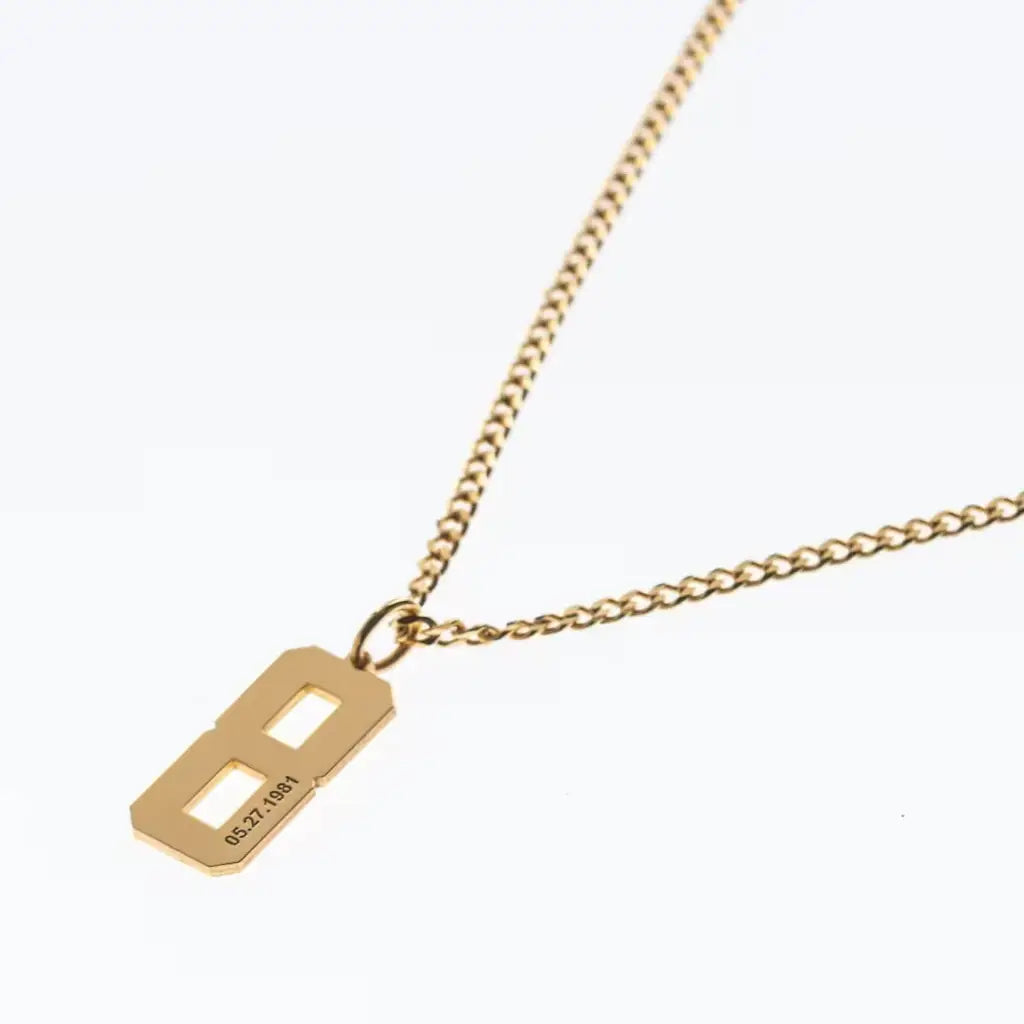 Trendy and elegant, this stunning engraved number gold necklace for men is made of genuine genuine 18k solid gold. A thoughtful luxury anniversary gift for your boyfriend or husband, and the perfect expensive birthday gift for a father or a brother.