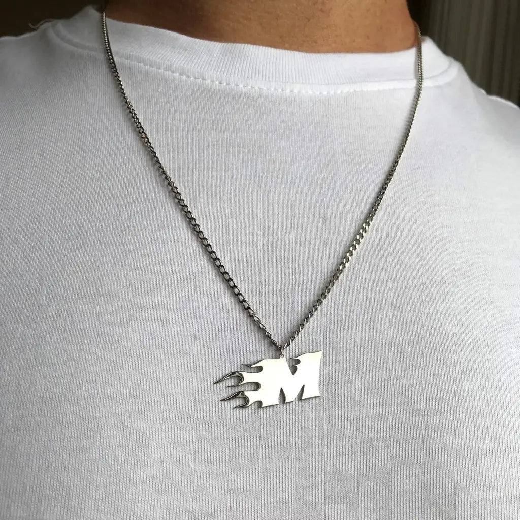 Trendy and elegant, this stunning flame gold letter pendant for men is made of genuine genuine 18k solid gold. A thoughtful luxury anniversary gift for your boyfriend or husband, and the perfect expensive birthday gift for a father or a brother.