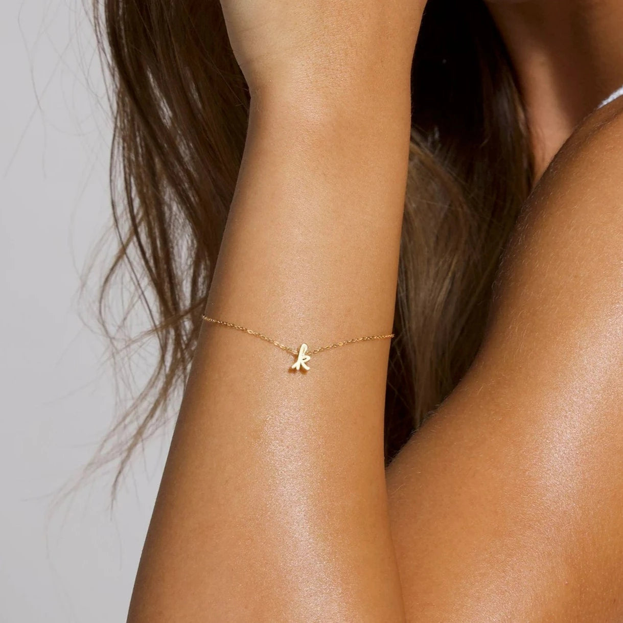 Gold initial bracelet - made in 18 carat gold, handcrafted in Dubai, UAE