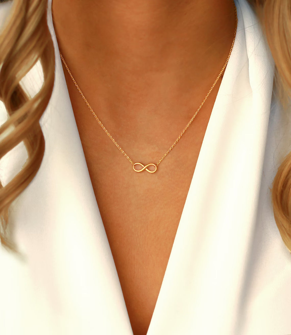 18 Carat Gold Infinity Necklace - A symbol of timeless union, capturing the enduring connections and infinite elegance inspired by Arabian jewelry in the heart of the UAE.
