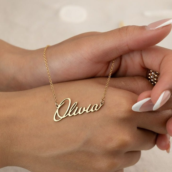 Gold name necklace - A personalised gift for wife. Handcrafted in Dubai, United Arab Emirates.