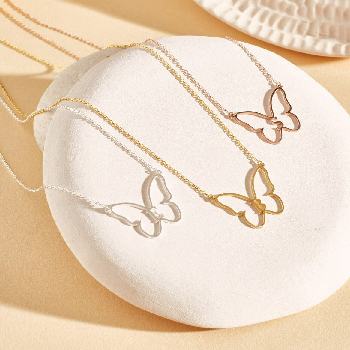 Indulge in the Timeless Beauty of Gold Our gold jewelry collection is meticulously crafted to perfection, combining traditional craftsmanship with modern design. Each piece tells a story, capturing the essence of love and devotion.