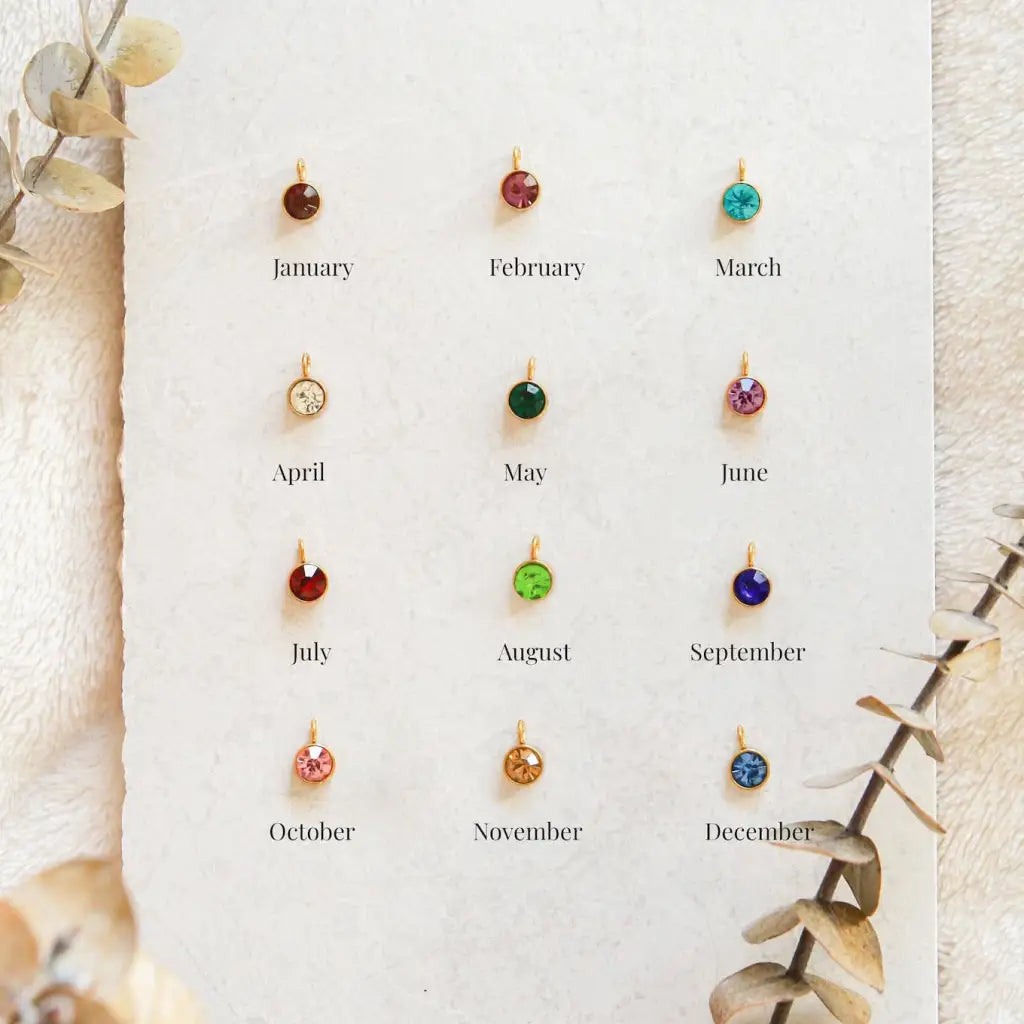 Gold Heart-shaped Birthstone Necklace - available in gold. Made in real gold, this birthstone heart-shaped name necklace is locally handcrafted with the highest quality materials and artisans available in Dubai. Great addition to your jewelry collection and is also the ideal gift for a loved one.