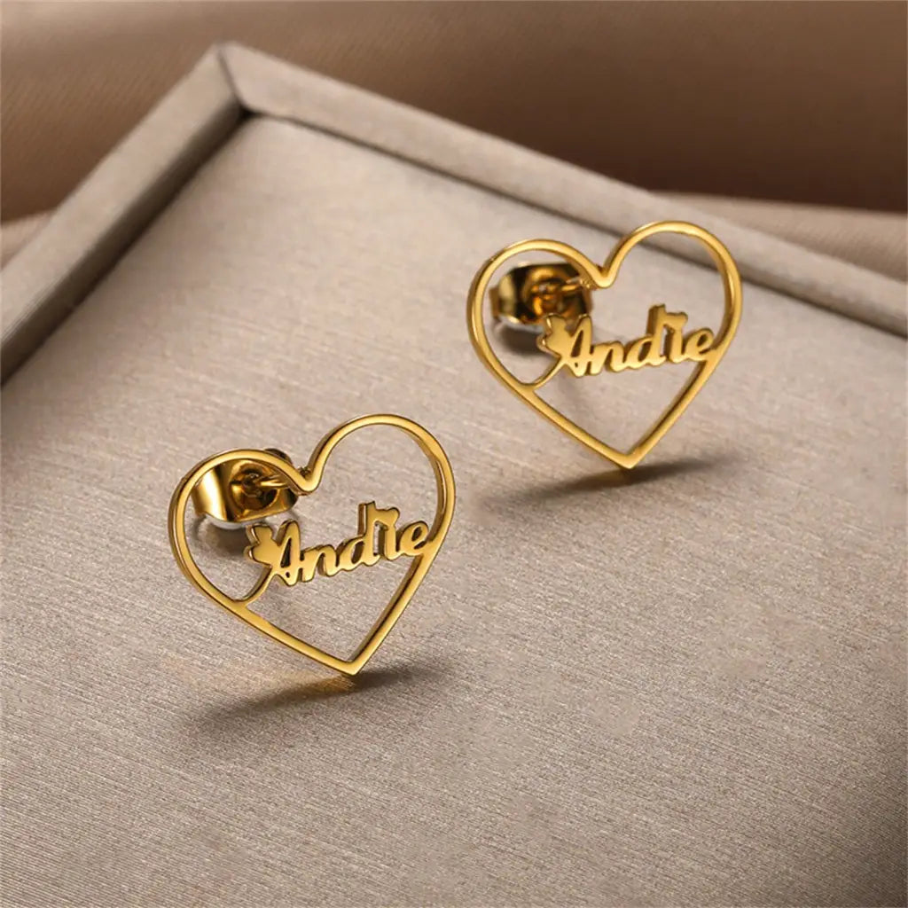 Gold Heart-shaped Hoop Earrings. Designed and handcrafted in the UAE. This fine pair of Gold Heart-shaped Hoop Earrings is locally handcrafted with the highest quality materials and artisans available in Dubai.