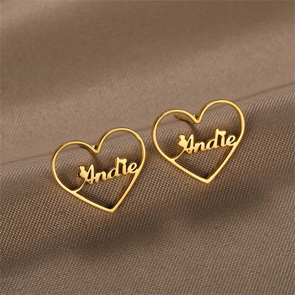 Gold Heart-shaped Hoop Earrings. Designed and handcrafted in the UAE. This fine pair of Gold Heart-shaped Hoop Earrings is locally handcrafted with the highest quality materials and artisans available in Dubai.