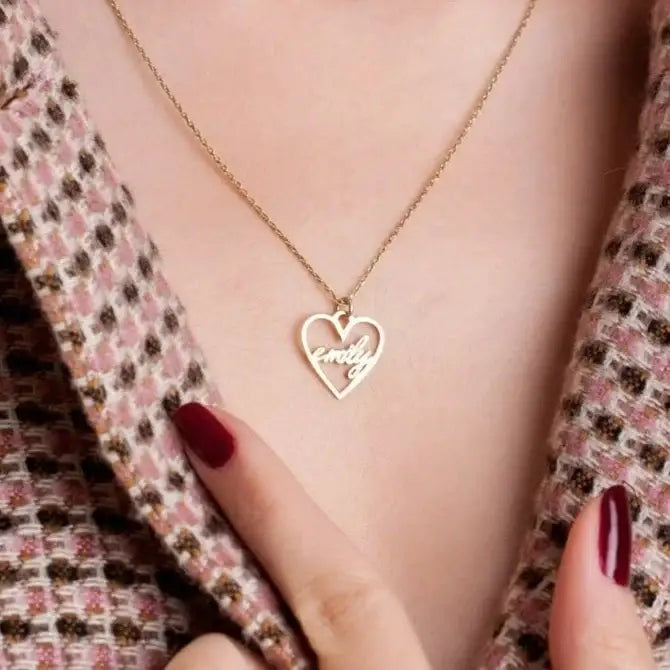 18k Gold Heart-shaped Necklace. Made in genuine gold, this heart-shaped name necklace will add a touch of luxury to any outfit whether you're treating yourself or looking for a meaningful gift for that special someone.