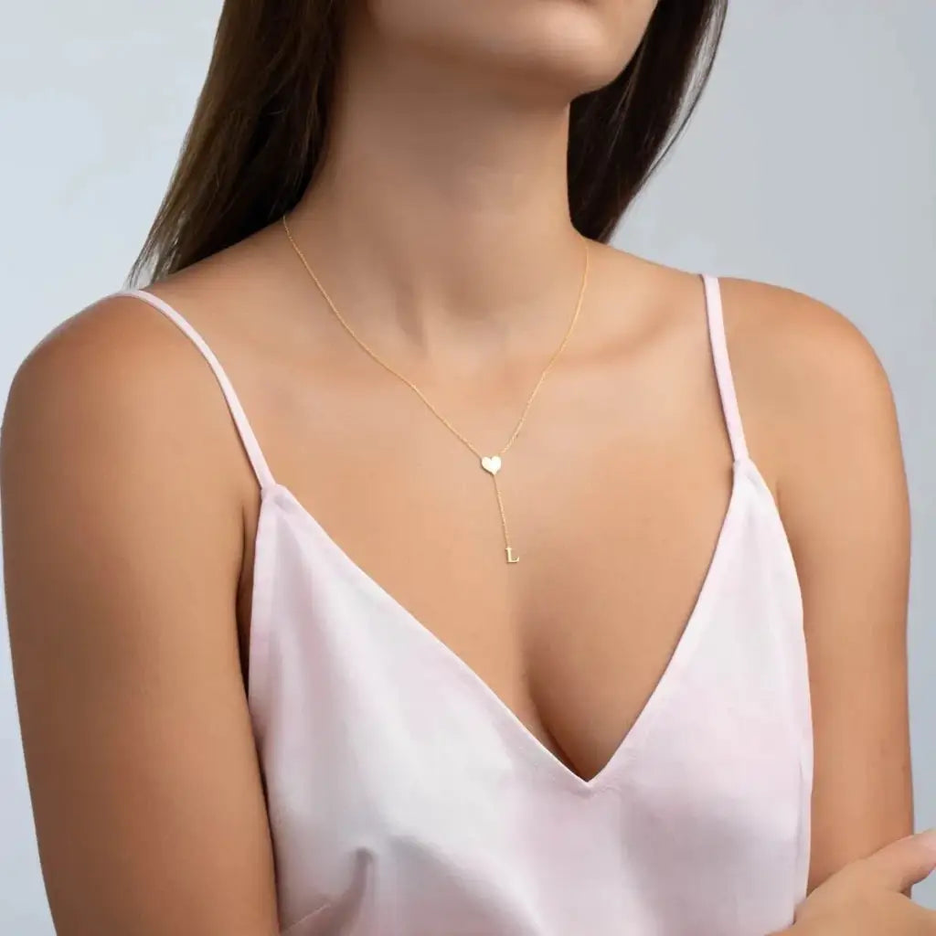 Gold Heart Single Letter Necklace Personalized, designed and handcrafted in the UAE.