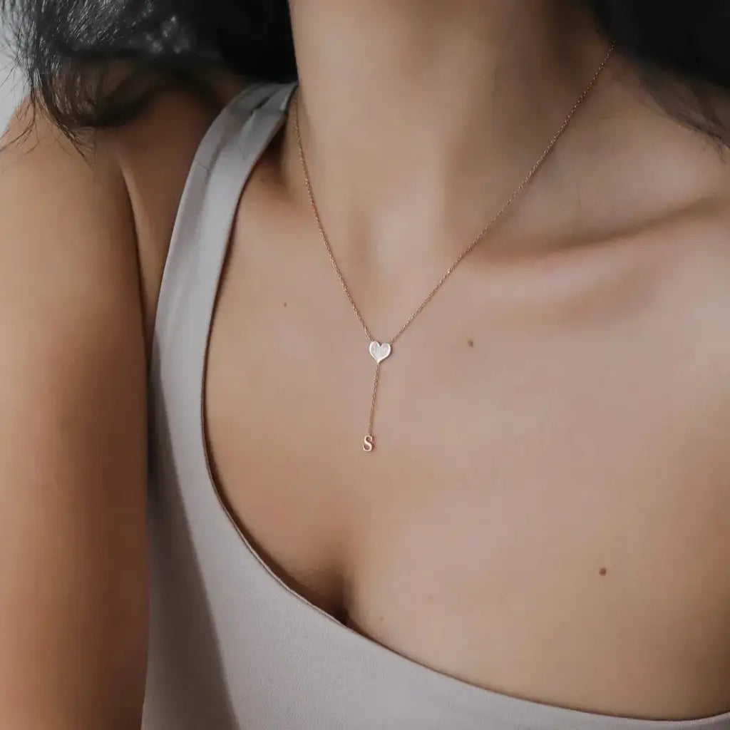 Gold Heart Single Letter Necklace Personalized, designed and handcrafted in the UAE.