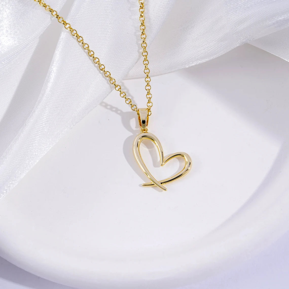 18 Carat Gold Heart-Shaped Necklace - A radiant symbol of love inspired by Arabian tales, designed for timeless elegance.