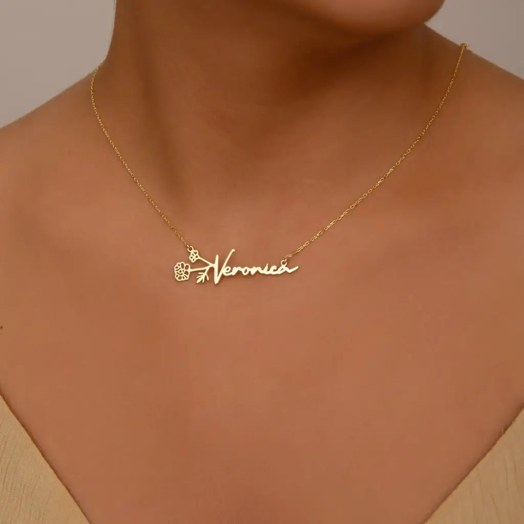 Gold Horizontal Birth Flower Necklace Designed and handcrafted in the UAE.