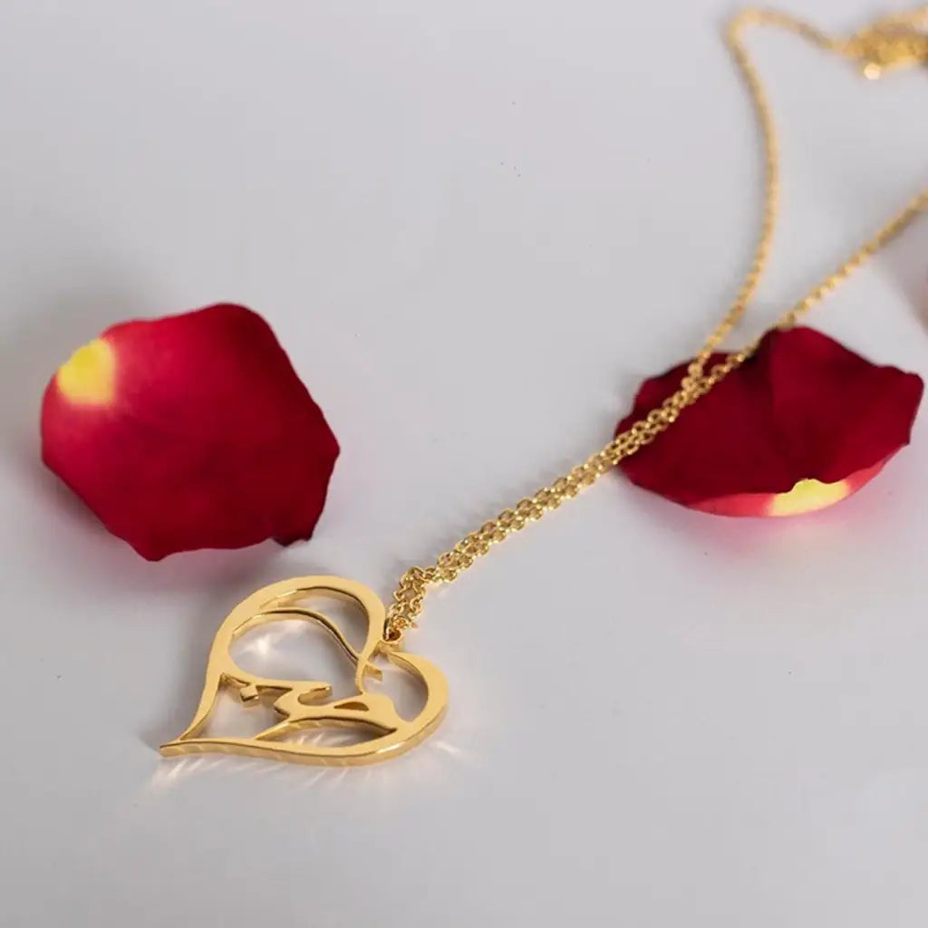 Arabian Name Hubb Love necklace. Designed and handcrafted in the UAE. These gold alphabet love name necklace are locally handcrafted with the highest quality materials and artisans available in Dubai. The perfect Valentine's Day gift.