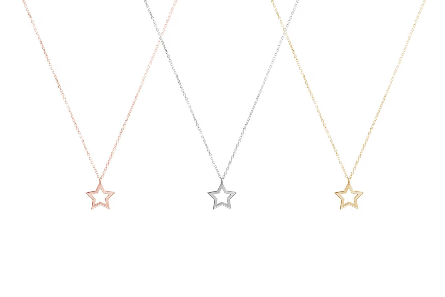 Indulge in the celestial charm of our 18 Carat Gold Tiny Star Necklace - Burst of Arabia. A radiant tribute to Arabian nights, adorned with miniature stars in pure gold.