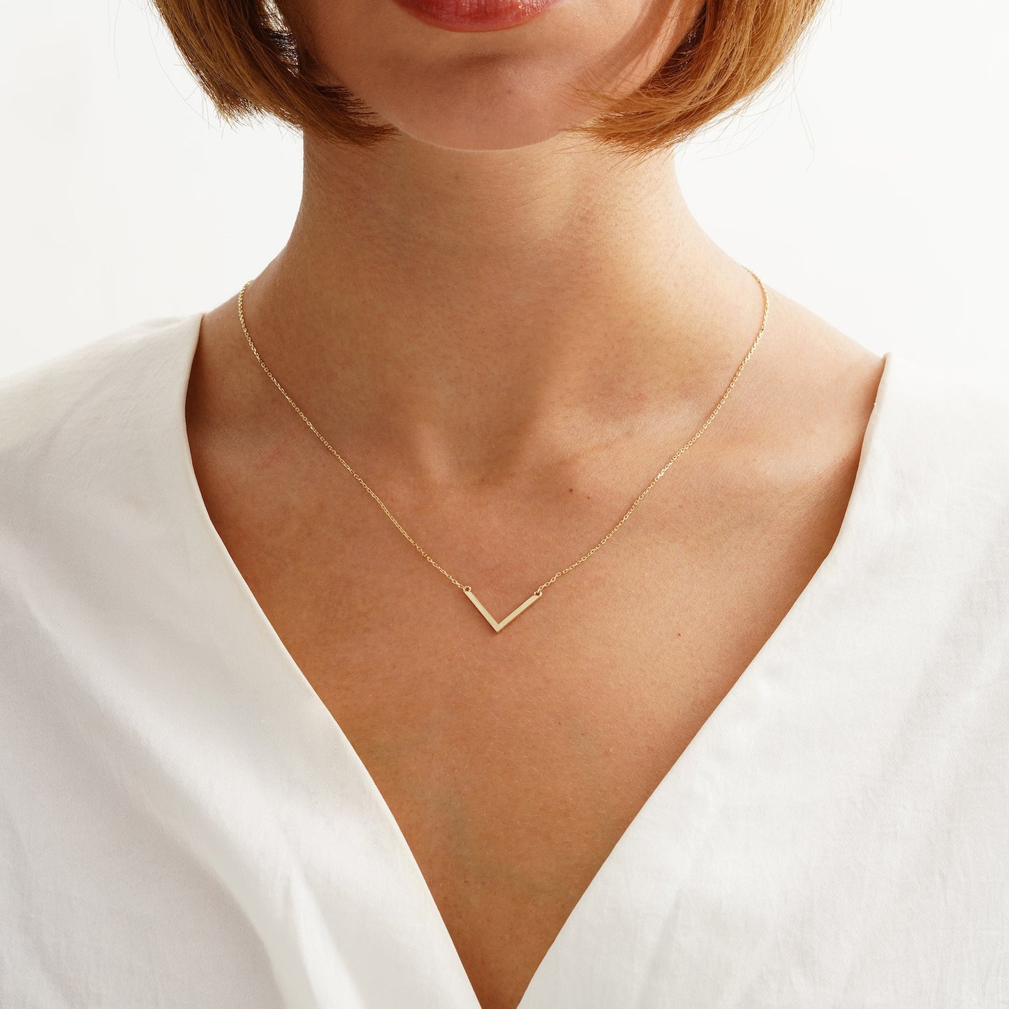 18 Carat Gold V-Shaped Necklace - Burst of Arabia - Elevate Your Style with Modern Sophistication in Exquisite Arabic Jewelry.