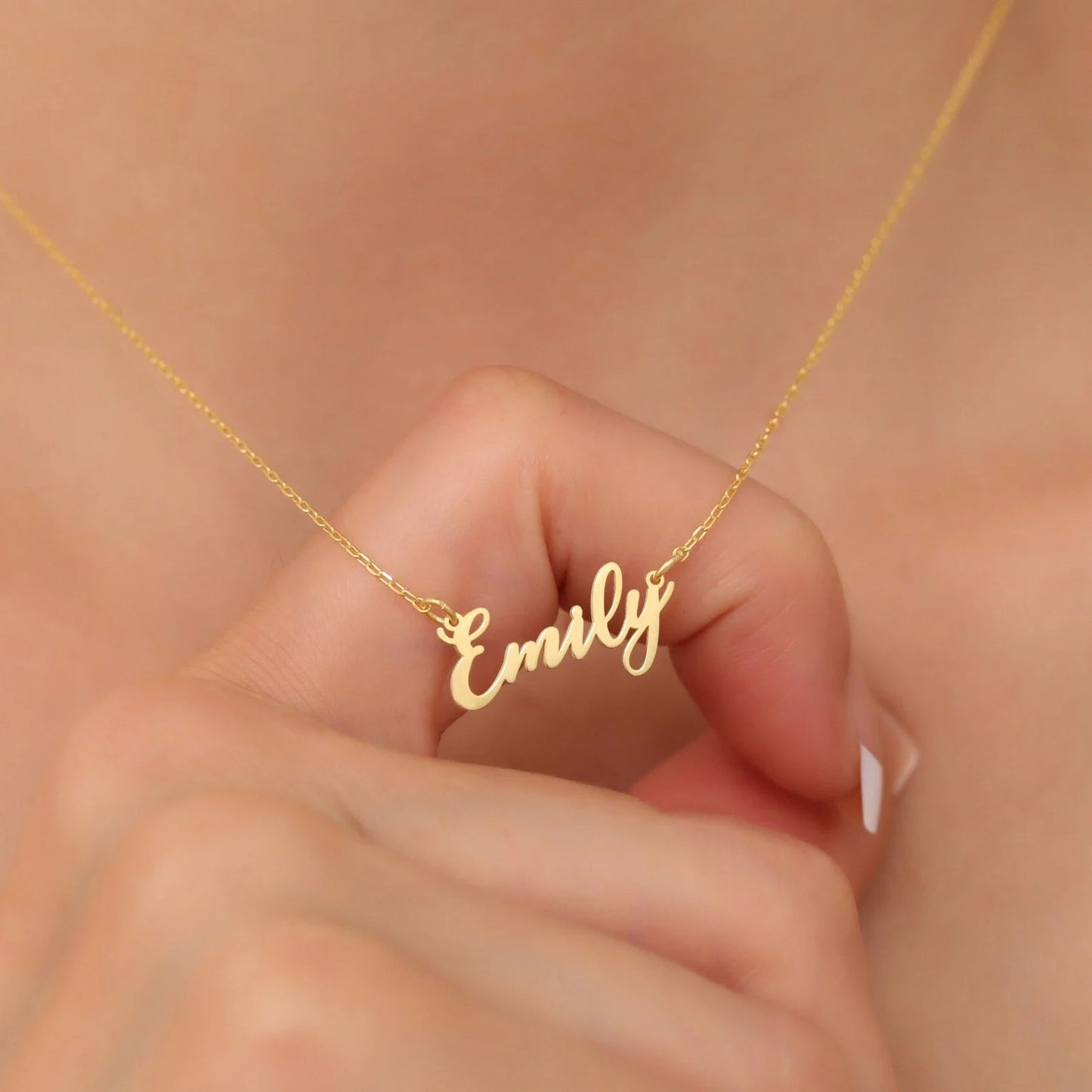 Gold Personalized Name Necklace Designed and handcrafted in the UAE. This classic gold name necklace is locally handcrafted with the highest quality materials and artisans available in Dubai. Perfect gift for a best friend, lover and family.