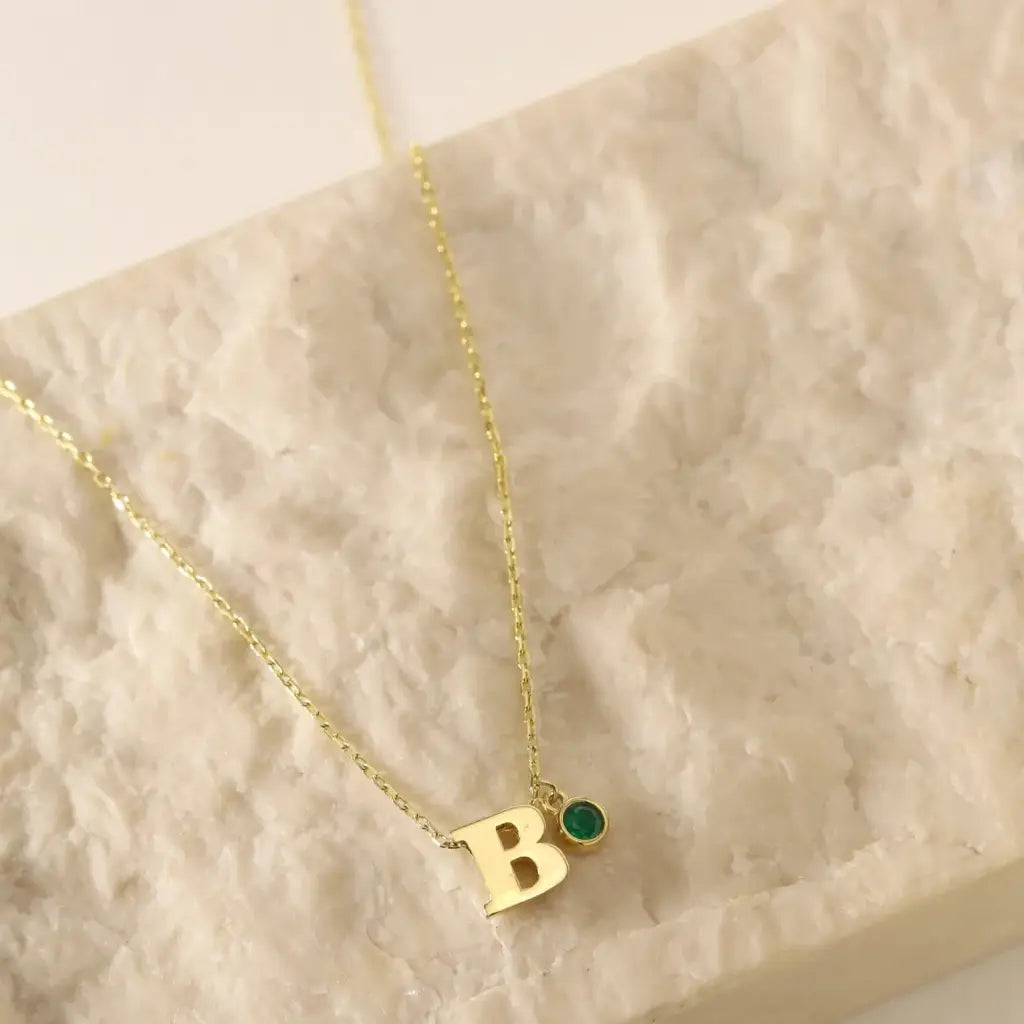 Personalized Initial Birthstone Necklace Designed and handcrafted in the UAE.