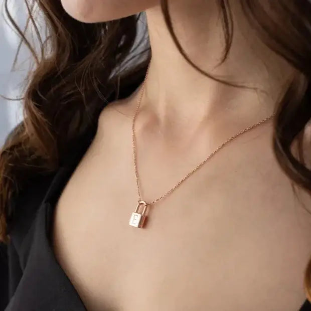 Gold Initial Padlock Necklace Personalized, designed and handcrafted in the UAE. Delivers within 2 to 5 business days. This stunning gold Initial padlock necklace is locally handcrafted with the highest quality materials and artisans available in Dubai.