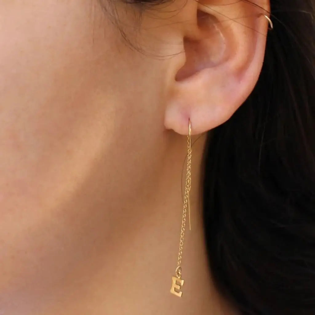 This pair of gold initial earrings is locally handcrafted with the highest quality materials and artisans available in Dubai. Our jewelry is locally handcrafted with the highest quality materials and artisans available in Dubai.