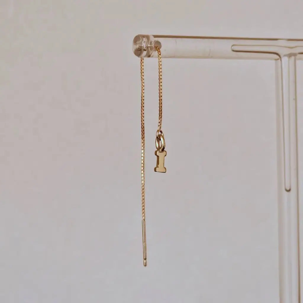 This pair of gold initial earrings is locally handcrafted with the highest quality materials and artisans available in Dubai. Our jewelry is locally handcrafted with the highest quality materials and artisans available in Dubai.