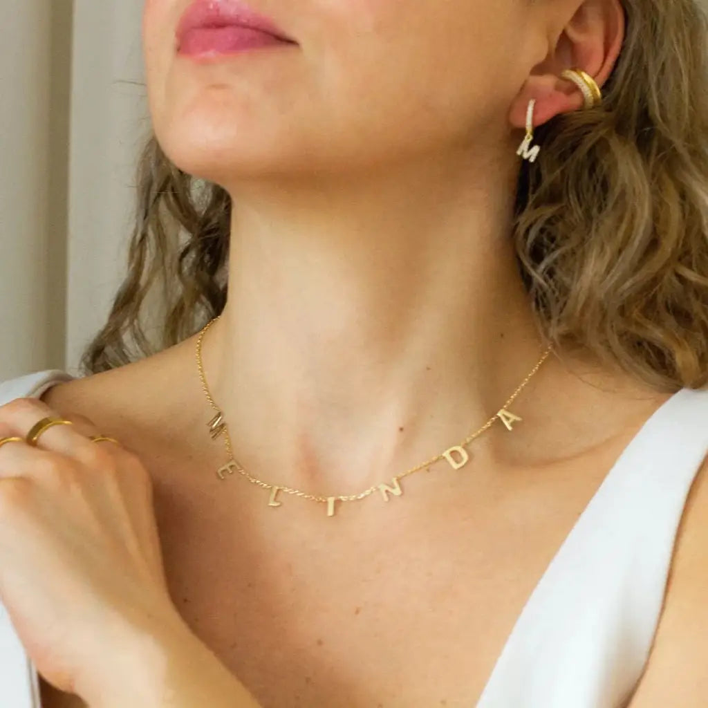 Gold Alphabet Letter Necklace Customized and handcrafted in the UAE.