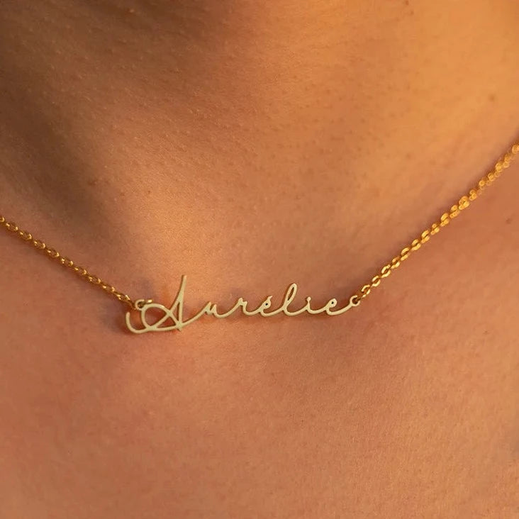 Gold Personalized Name Necklace Designed and handcrafted in the UAE. This classic gold name necklace is locally handcrafted with the highest quality materials and artisans available in Dubai. Perfect gift for a best friend, lover and family.